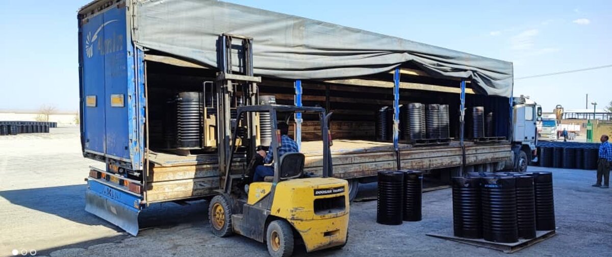 Drums loaded onto truck
